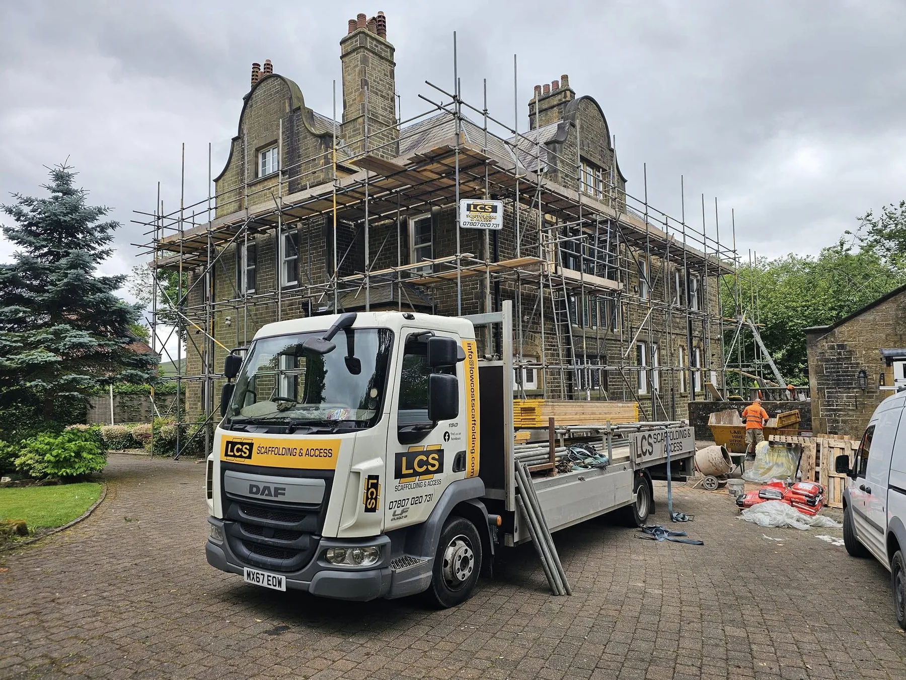 Scaffold access around a heritage style property with branded LCS vehicle